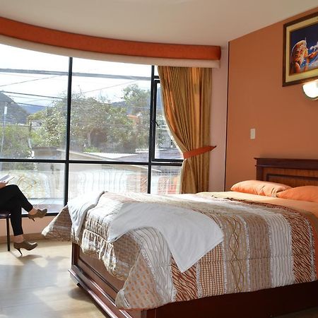 Club Ejecutivo Hotel บาญอส ห้อง รูปภาพ